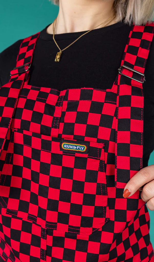 Run and fly red black checkerboard dungarees
