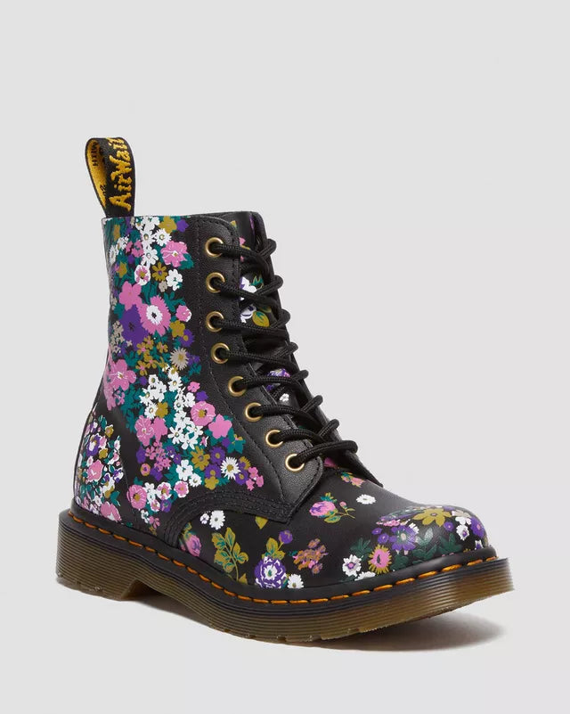 Ankle high Dr Martens boots with all over floral print pattern. Order now at Captain Jellyfish UK
